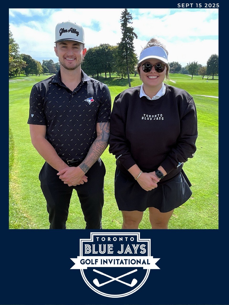 Two guests posing at the Toronto Blue Jays Golf Invitational