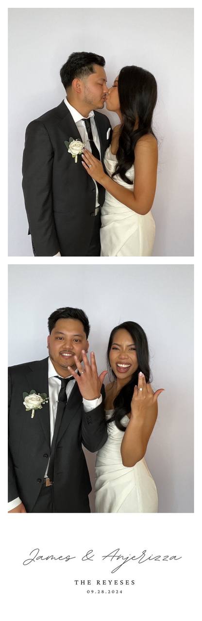 Newlyweds posing together in a Reel One photo booth wedding keepsake